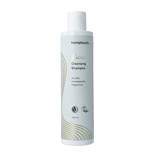 Hemptouch Revive cleansing shampoo 250ml for hair care, featuring natural ingredients and gentle cleansing action.