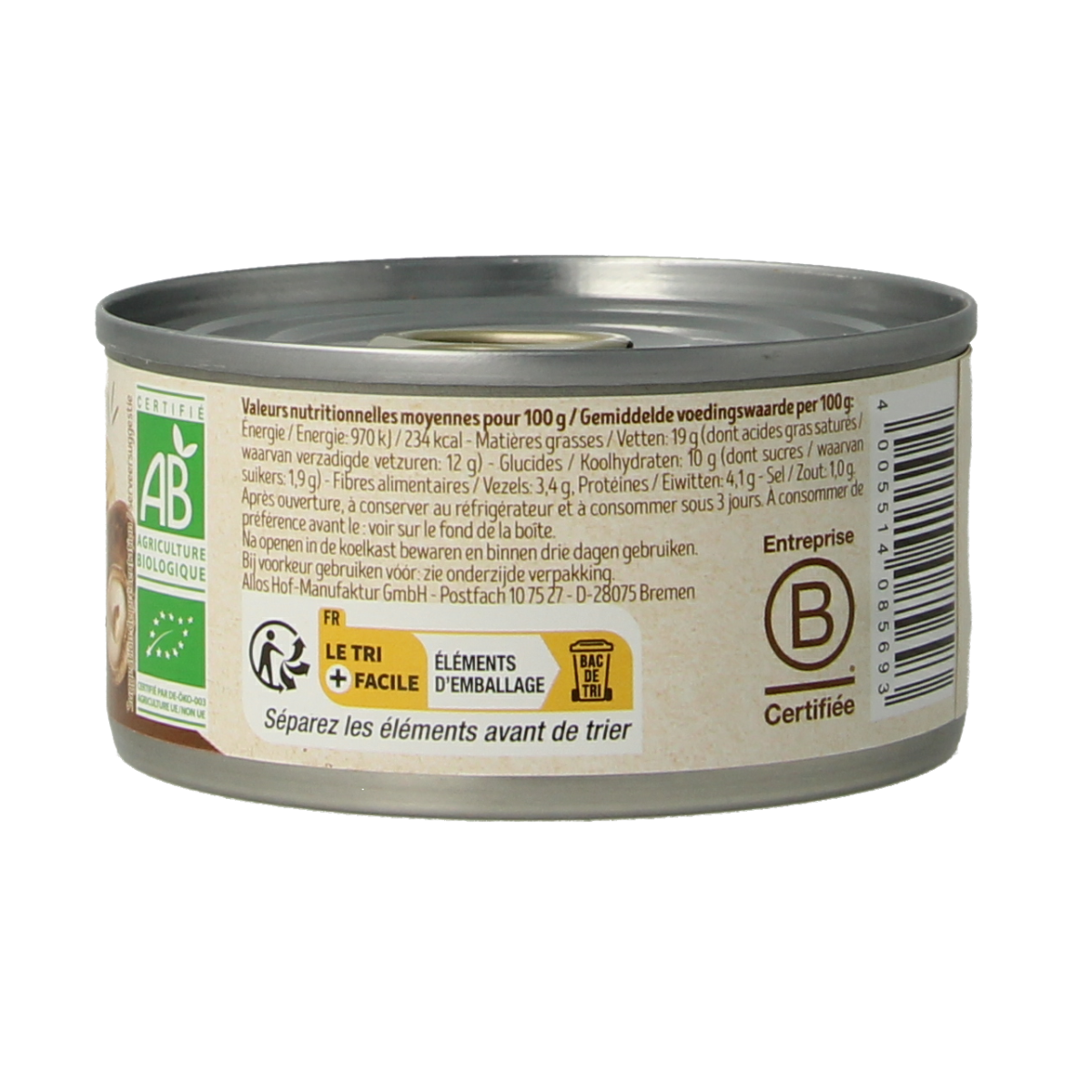 Tartex organic mushroom pâté spread on bread, showcasing smooth texture and fresh mushroom ingredients in a jar.