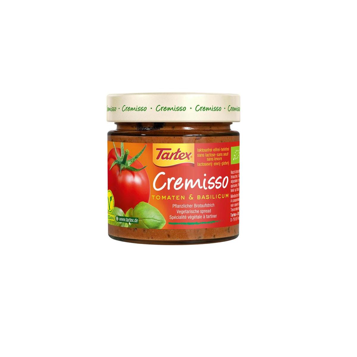 Tartex Cremisso tomato basil organic spread on bread, showing creamy texture and fresh basil leaves for breakfast or snack.