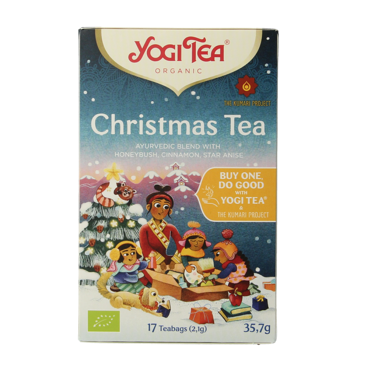 Yogi Tea Christmas herbal tea in a box with 17 biodegradable tea bags, festive packaging, and tea leaves visible.