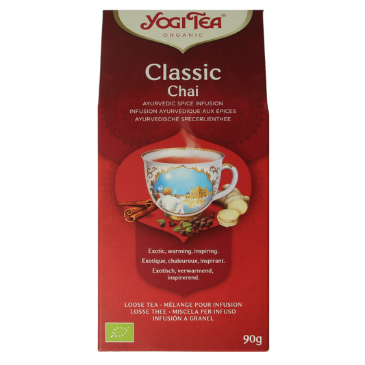 Organic Yogi Tea Classic Chai in 90g package, featuring a warm blend of spices and black tea for a comforting beverage.