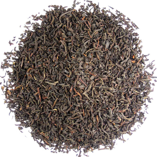 Geels Earl Grey Dutch special tea in a 1kg package, featuring a box of tea with Earl Grey branding and tea leaves visible.