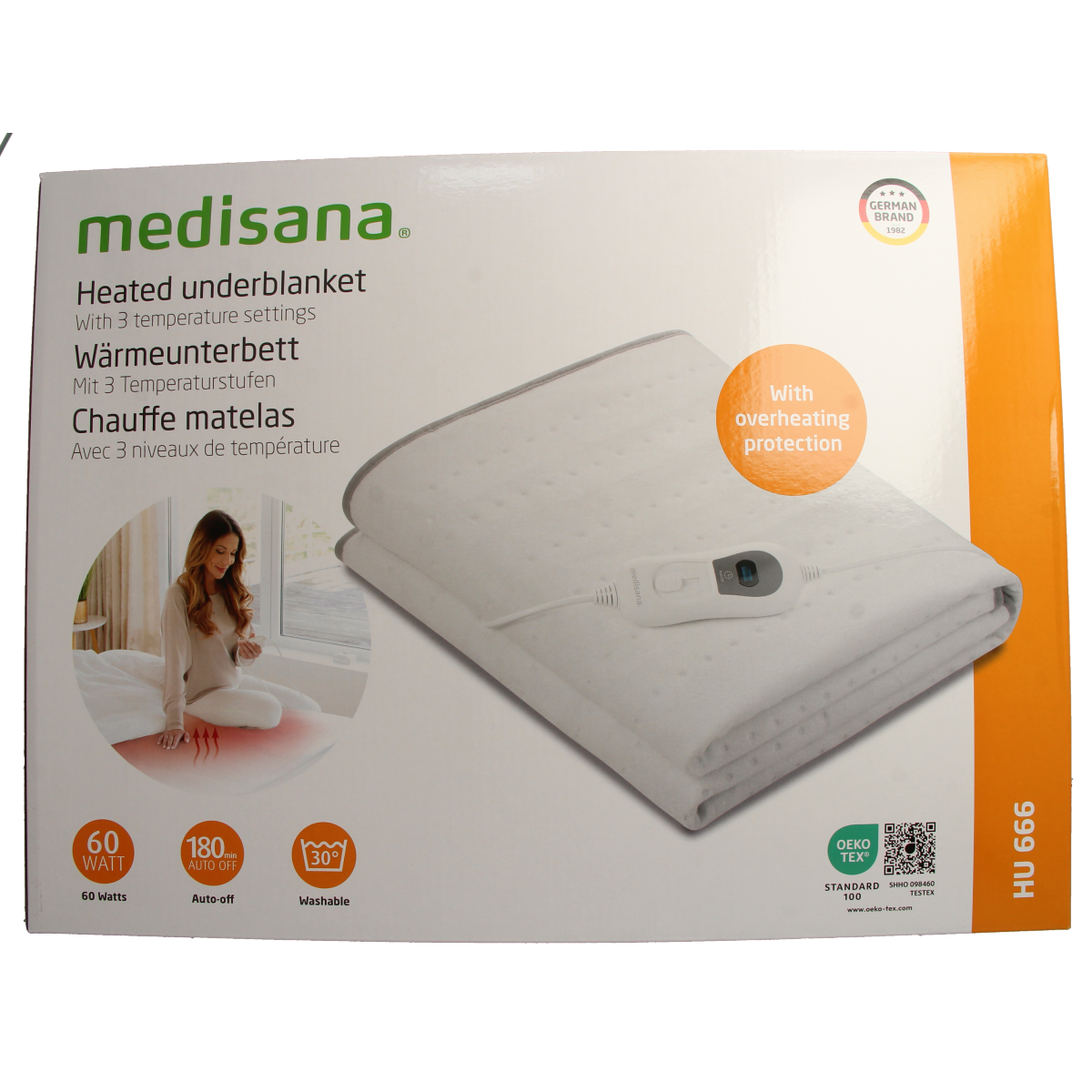 Medisana Warmteonderdeken HU 666 in a bedroom setting, showing the electric heating blanket with control panel and cozy fabric.