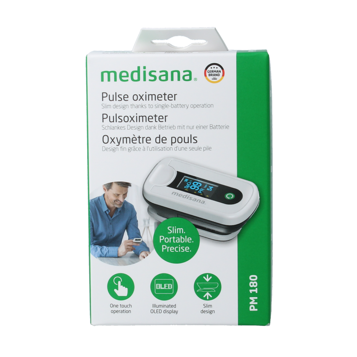 Medisana PM180 saturation and pulse oximeter device showing digital display with finger clip for measuring blood oxygen levels and pulse rate.