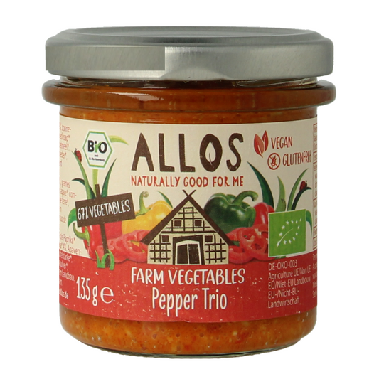 Allos Farm bio vegetable pepper trio spread on bread, featuring colorful red, yellow, and green peppers in a 135g jar.