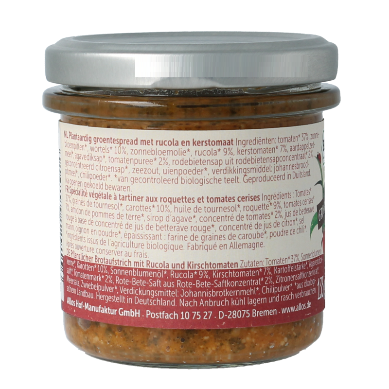 Allos bio vegetable spread with rucola and cherry tomatoes on bread, showcasing fresh, organic toppings.