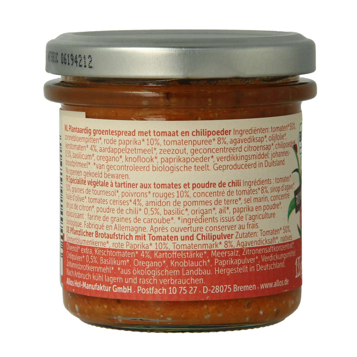 Allos Farm spicy tomato bio vegetable spread on bread, featuring vibrant red tomatoes and fresh herbs.