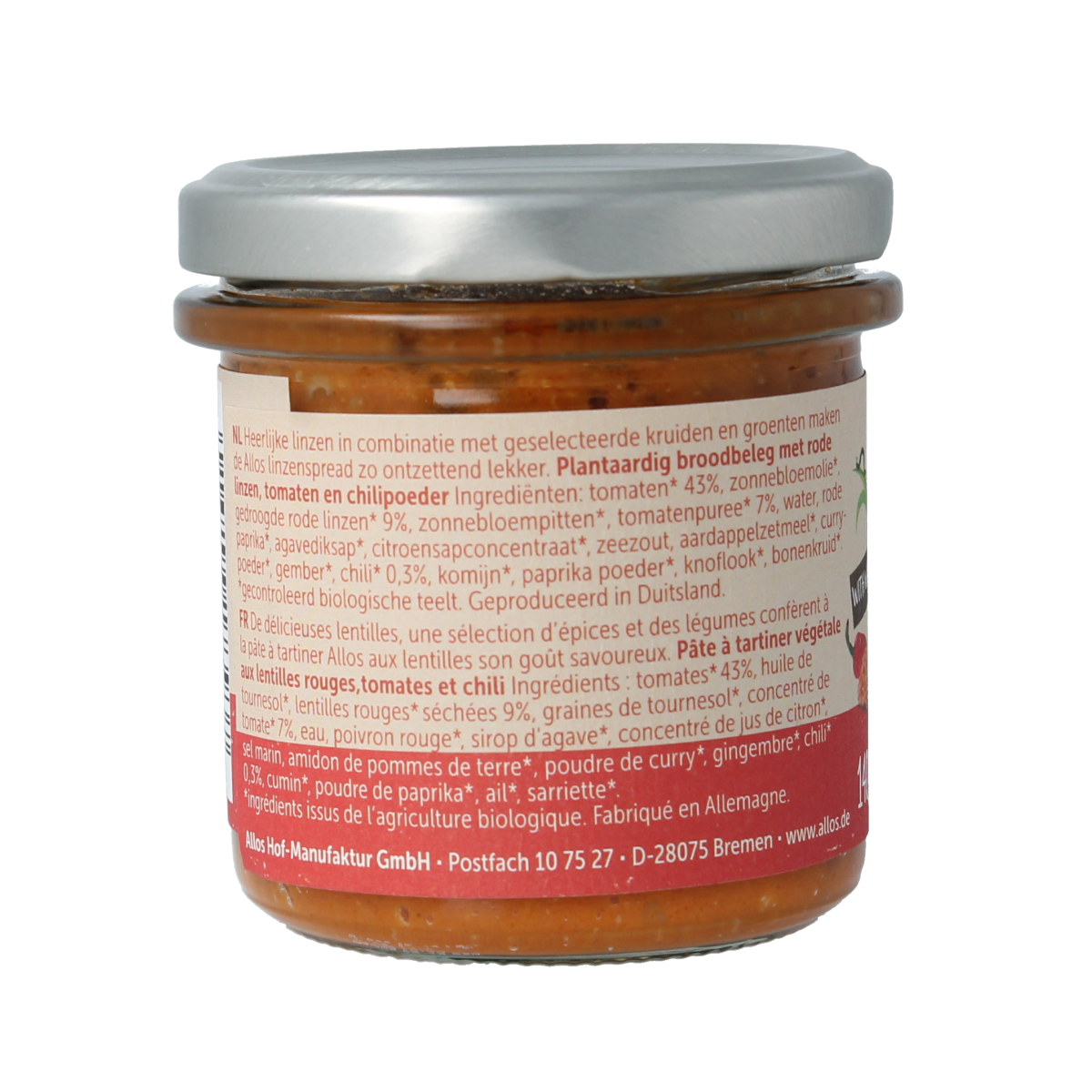 Allos bio red chili lentil spread on bread, showcasing vibrant red color and smooth texture in a close-up image.
