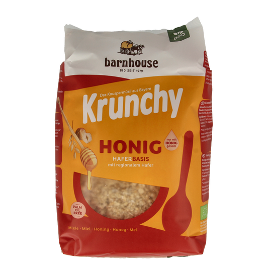 Barnhouse Krunchy Honing bio breakfast cereal in a 600g package, showing the crunchy oat flakes with honey flavor.