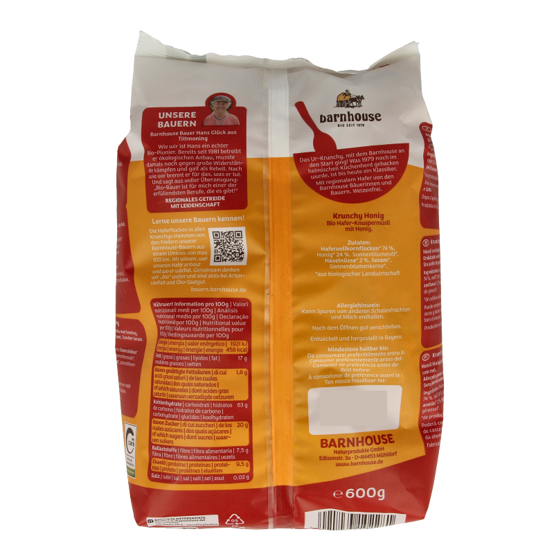Barnhouse Krunchy Honing bio breakfast cereal in a 600g package, featuring crunchy oats and honey flavor.