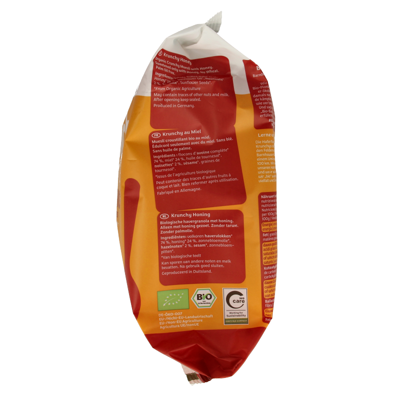 Barnhouse Krunchy Honing bio breakfast cereal in a 600g package, showing crunchy whole grain flakes with honey.