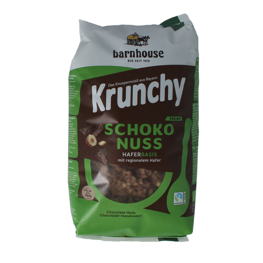 Barnhouse organic chocolate hazelnut muesli in a 750g package, featuring crunchy cereal with chocolate and hazelnuts.