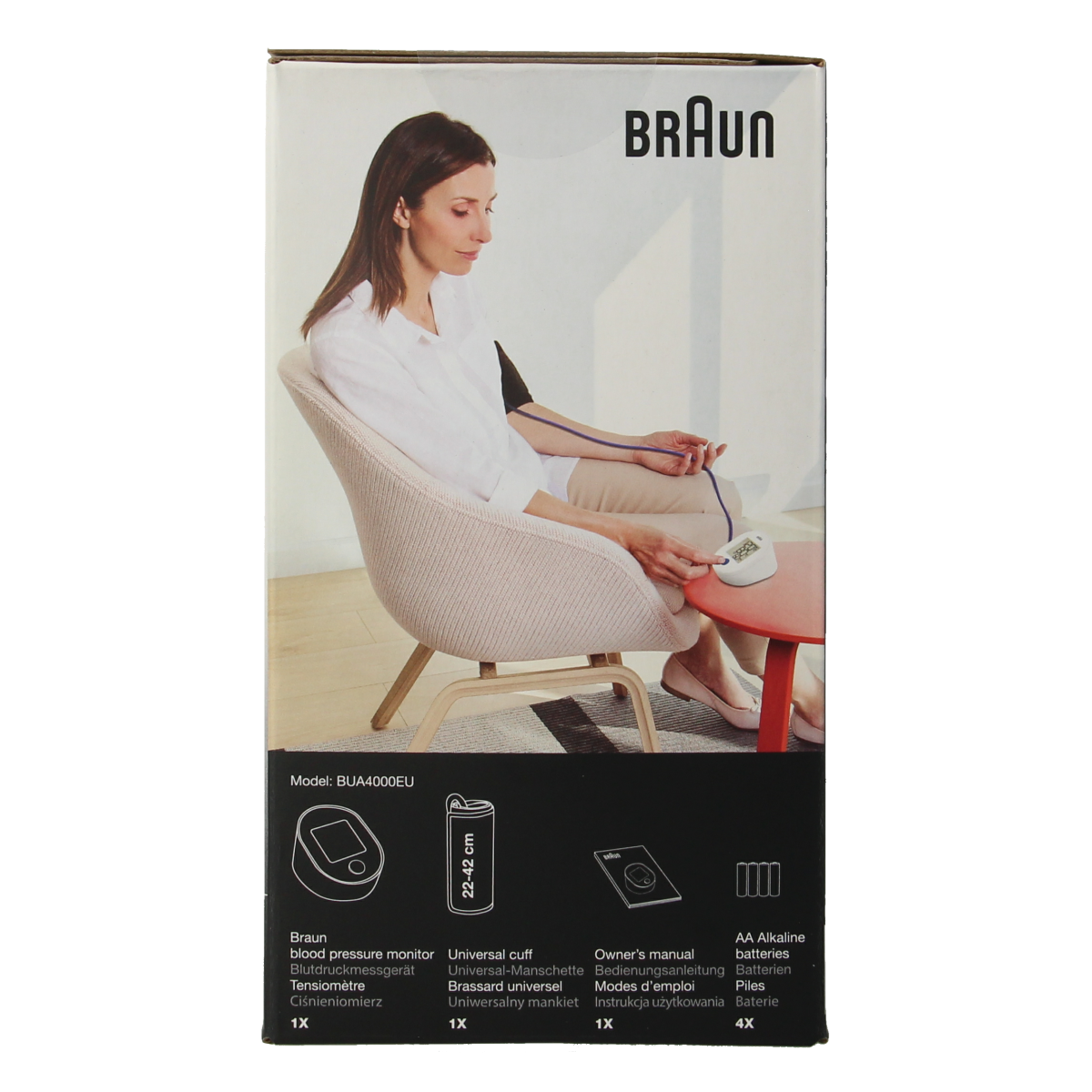 Braun Exactfit 1E upper arm blood pressure monitor with cuff, digital display, and control buttons for accurate blood pressure readings.