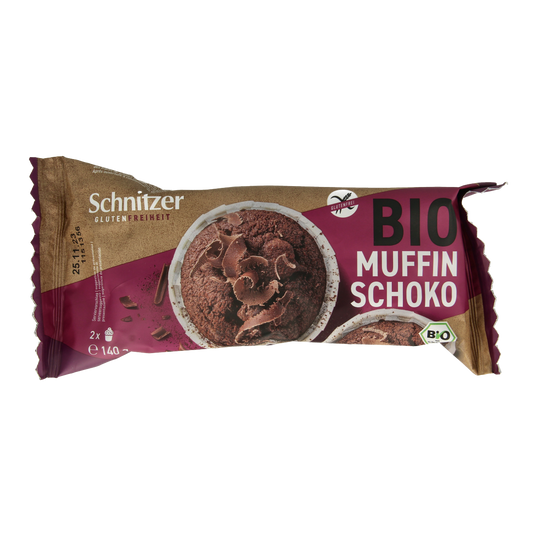 Schnitzer gluten-free chocolate muffin in a 140g package, showing a moist, chocolatey koeken with a rich texture.