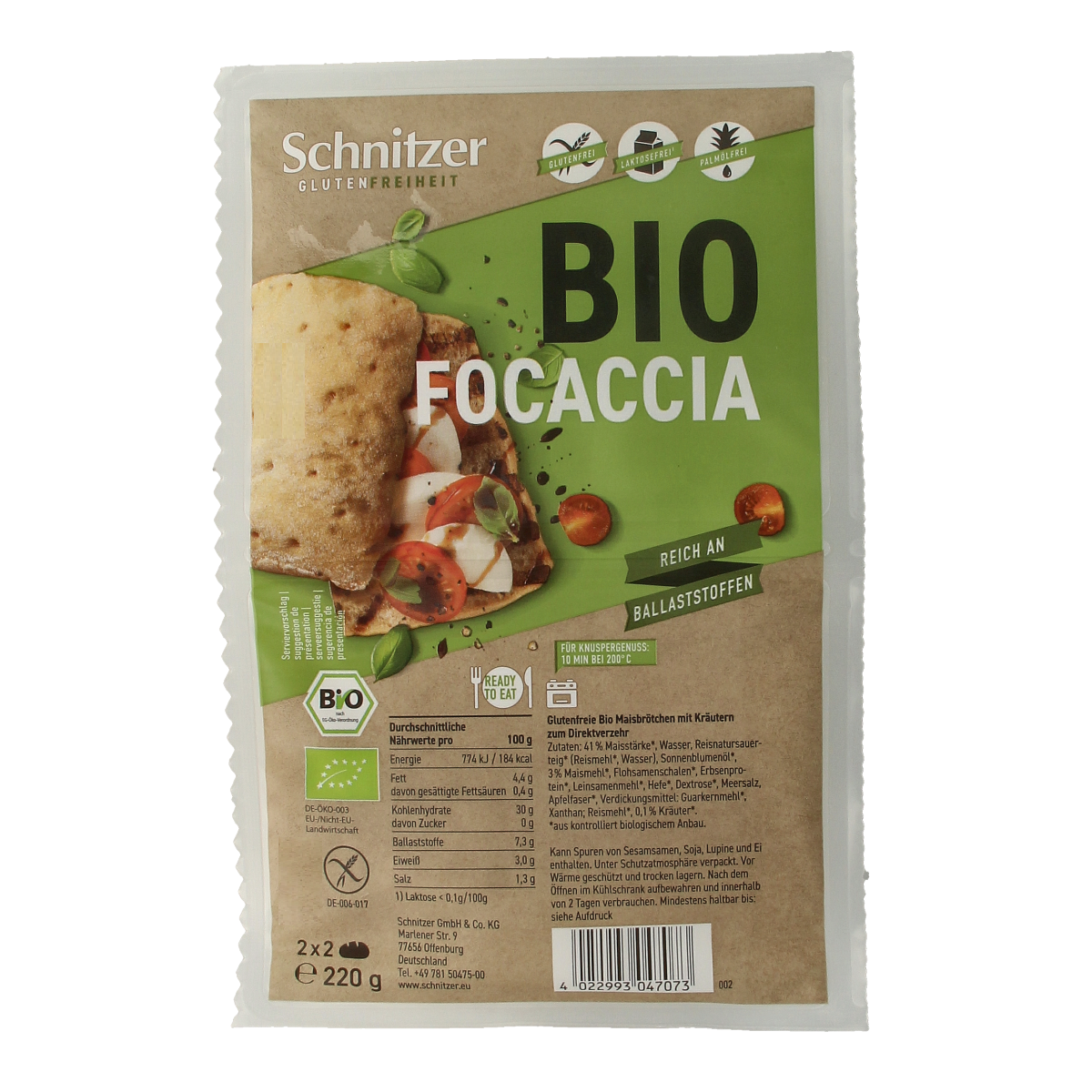 Schnitzer gluten-free bio focaccia bread, 4 pieces, 220g, shown on a white surface with a golden crust and soft interior.