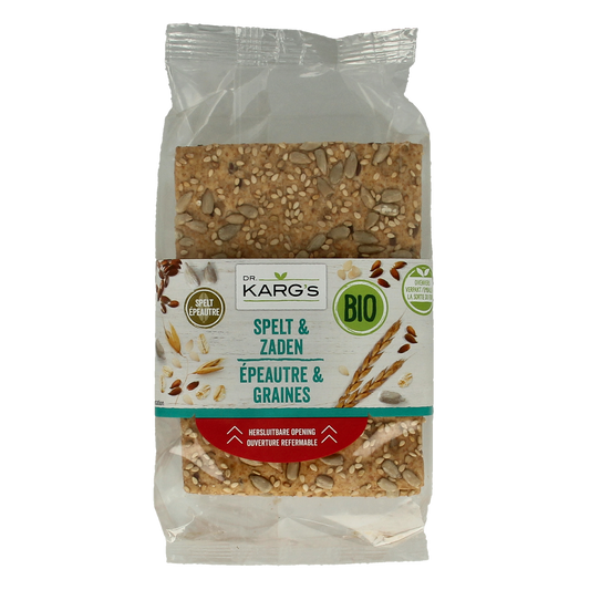 Whole grain spelt bread with seeds from Dr. Karg's, showcasing a fresh, crusty loaf with visible seed toppings and a rustic appearance.