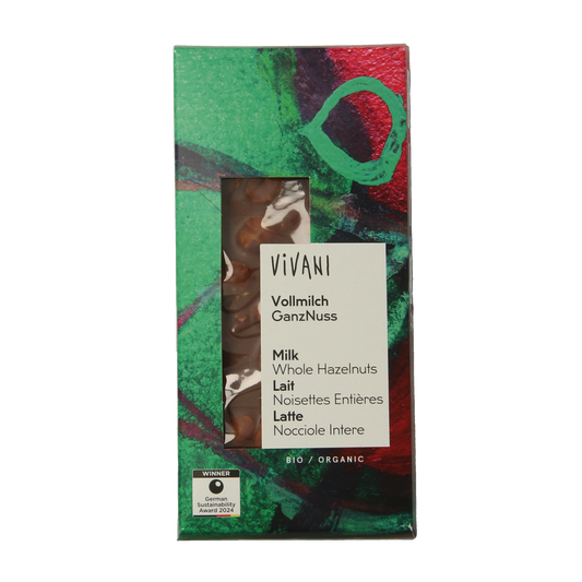 Milk chocolate Vivani bar with whole hazelnuts, organic, 100g, shown with pieces of hazelnuts and chocolate chunks