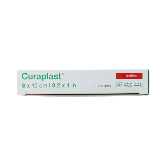 Curaplast Sensitive wound plasters, 8cm x 10cm, pack of 10, soft adhesive tape for sensitive skin, shown on a white background.