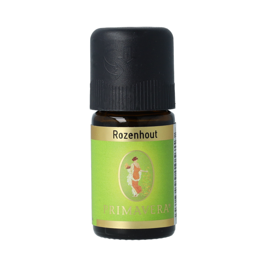 Primavera bio Rozenhout essential oil in a 5ml bottle, showing the amber glass container and label with product details.