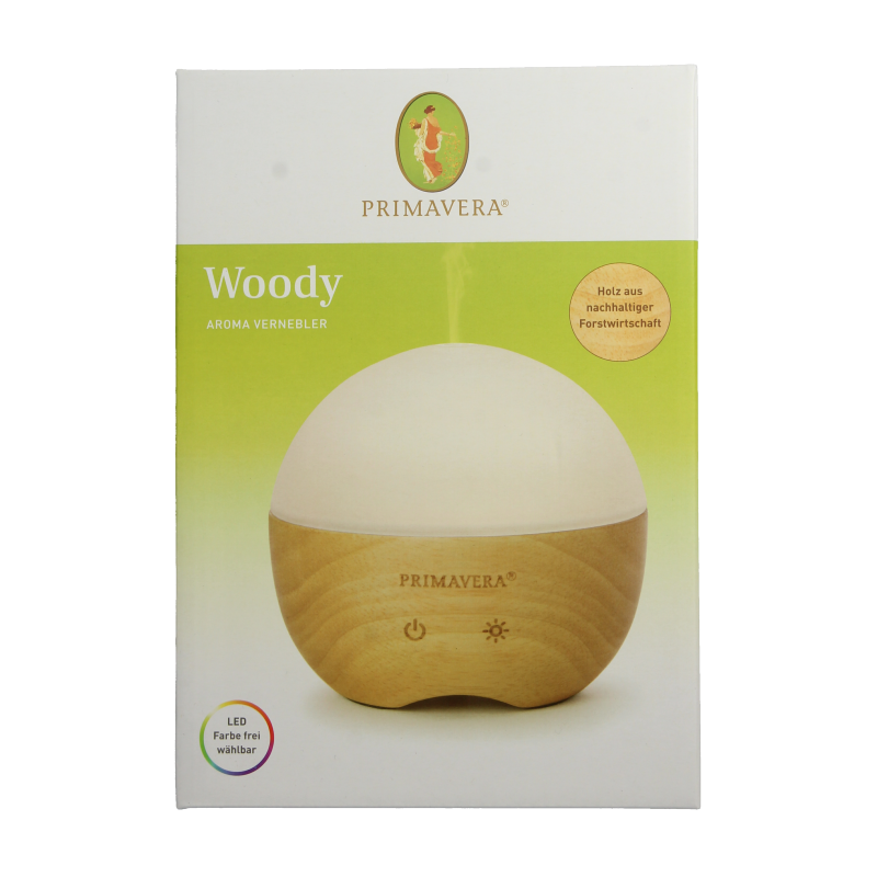 Primavera Aroma diffuser with woody design, showcasing a bottle of Primavera essential oils for aromatherapy.