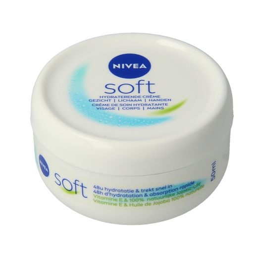 Nivea Soft mini 50ml body care pot showing smooth white cream inside, ideal for nourishing skin.