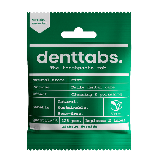Denttabs vegan fluoride-free mint toothpaste tablets in a box, 125 pieces, with packaging showing tablets and mint flavor label.