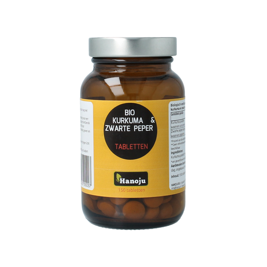 Hanoju Kurkumapoeder + piperine 500mg bio herbal supplement in tablet form, featuring turmeric and black pepper extract.