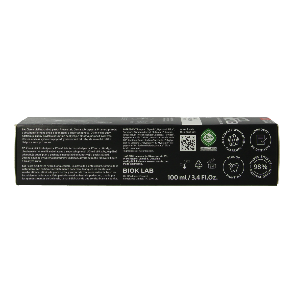 Ecodenta whitening toothpaste with charcoal in a 100ml tube, featuring black and white packaging with natural ingredients.