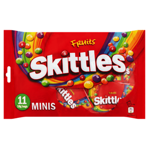 Assorted Skittles Fruits candy out-of-pack snack bags, colorful chewy fruit-flavored sweets in individual packets.