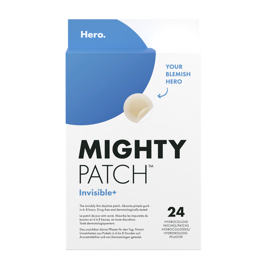 Hero Mighty Patch Invisible facial patches for acne treatment, shown on skin in a natural close-up image.