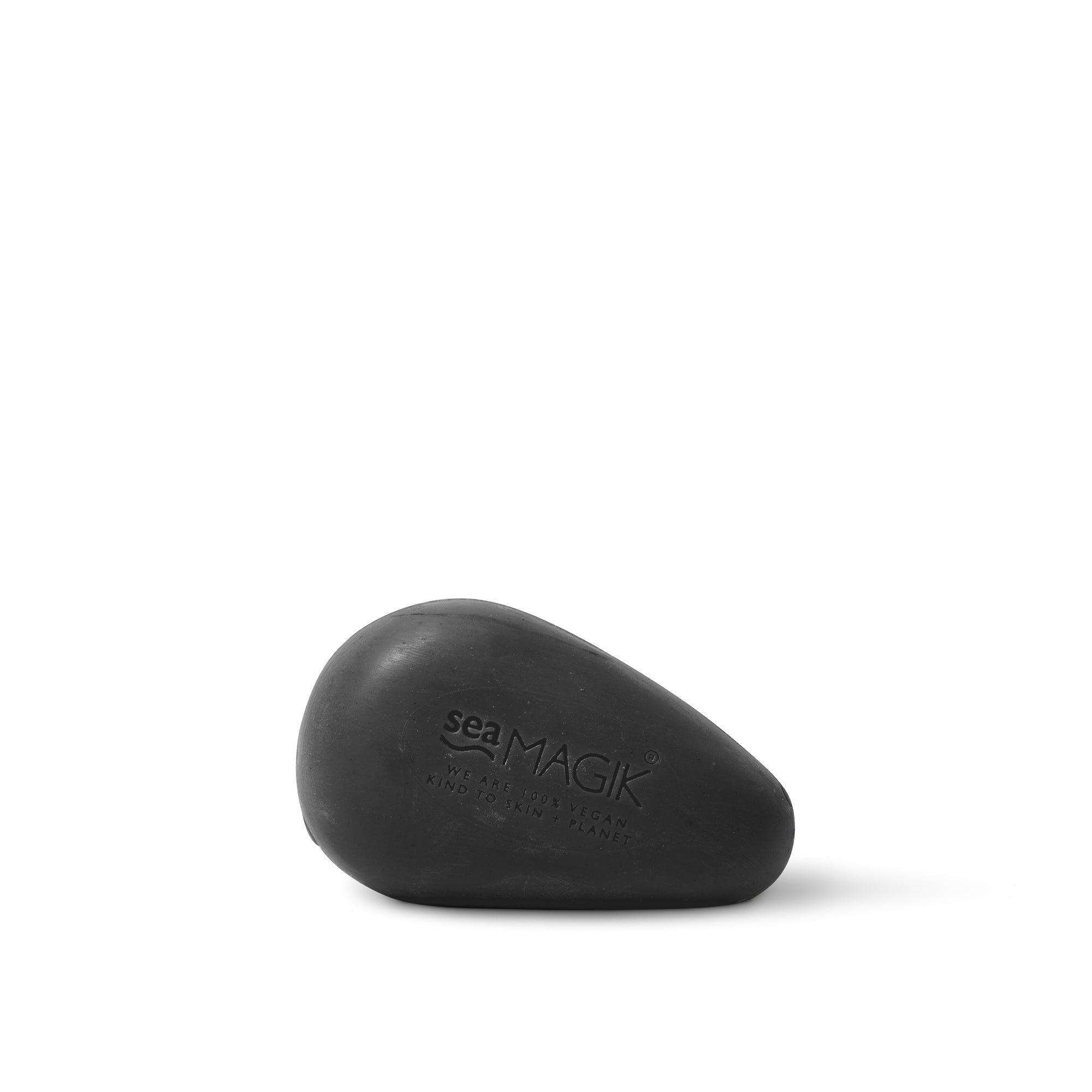 Sea Magik black mud soap in a 100g bar, natural zeep with dark, textured surface for deep cleansing and skin detox.