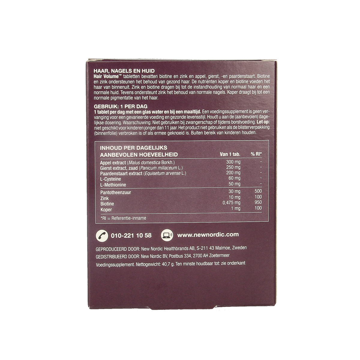 New Nordic Hair Volume herbal supplement tablets showing the product bottle and packaging for healthy hair support.