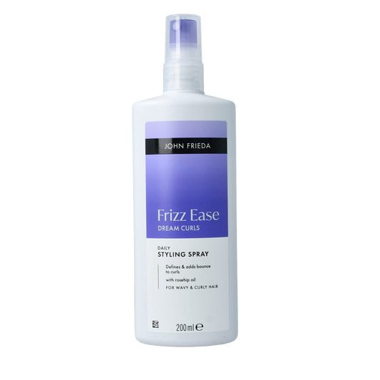 John Frieda Dream Curls styling spray bottle, 200ml, for enhancing and defining curly hair, in a sleek haircare packaging.
