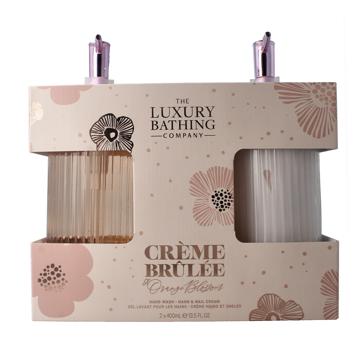 The Luxury Bathing Co Heavenly Hands hand wash and nail cream set in glass bottles, featuring elegant packaging and skincare products.