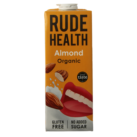 Bottle of Rude Health organic almond drink, 1 liter, with a label showing almonds and branding, in a clear glass bottle.