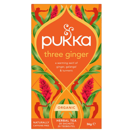 Pukka Three Ginger Bio tea bags box, organic herbal tea with ginger flavor, featuring vibrant packaging and tea bags inside.