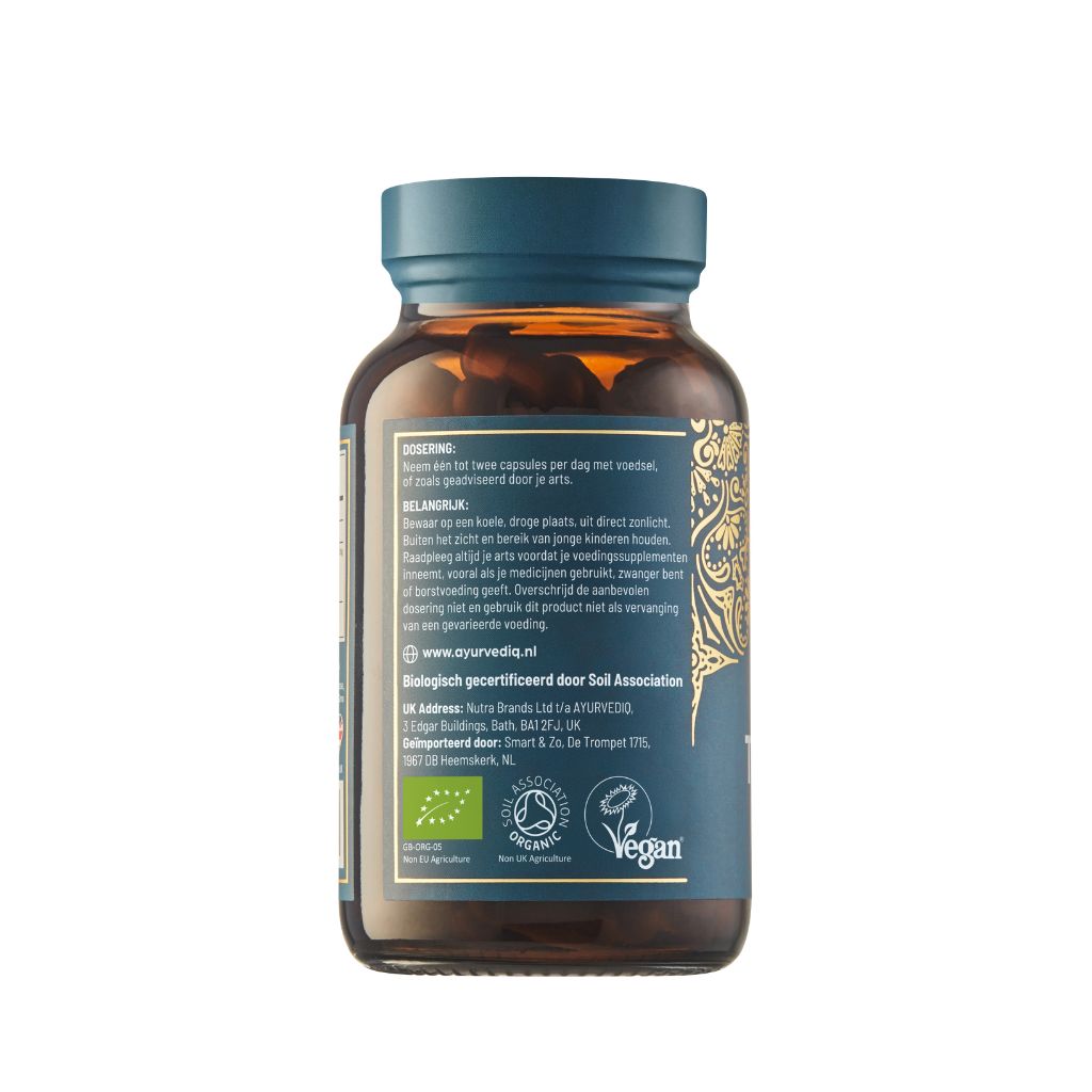 Ayurvediq biologische kurkuma capsules in a bottle, vegetarian herbal supplement for wellness and natural health.
