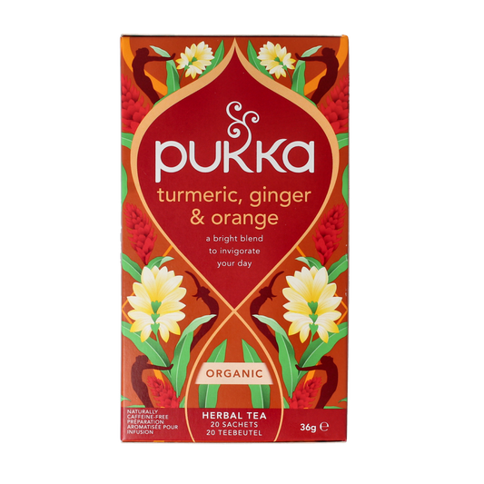 Pukka Turmeric Active Tea bio, 20 tea bags, featuring bright yellow turmeric root and herbal ingredients in a colorful box.