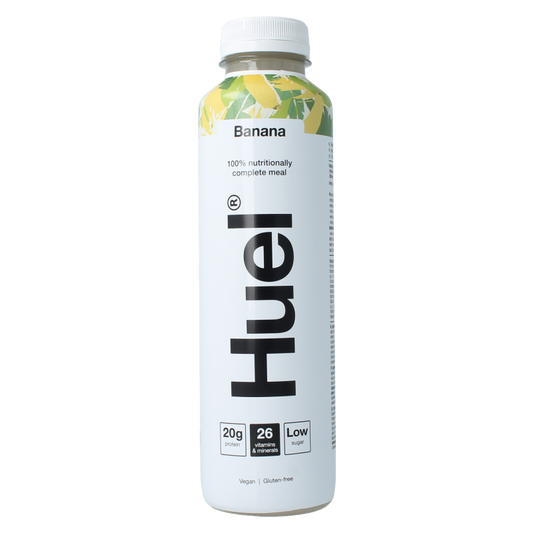 Huel White Edition banana meal replacement shake in 500ml bottle, featuring creamy banana flavor and white packaging.