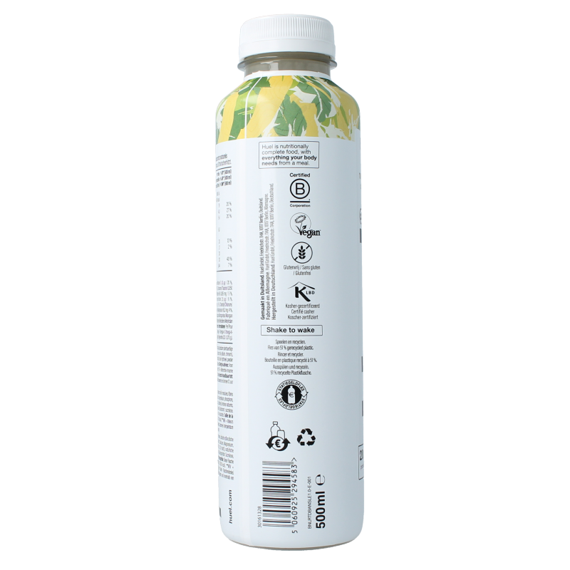 Huel White Edition banana meal replacement shake in 500ml bottle, featuring a white label with yellow banana graphics.