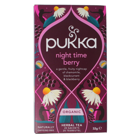 Pukka Night Time Berry herbal tea sachets in a box, featuring vibrant berry illustrations and natural packaging design.