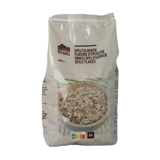 Organic Nutribel Speltvlokken breakfast cereal in a 500g package, showing golden spelt flakes in a clear bowl.