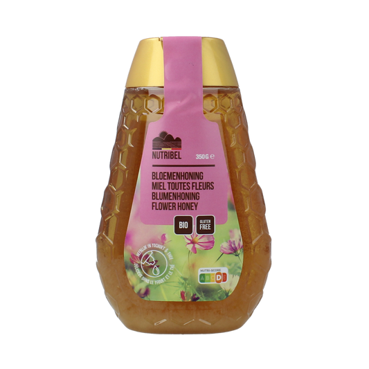 Nutribel Bloemenhoning 350g jar of floral honey with golden color and textured honeycomb surface.