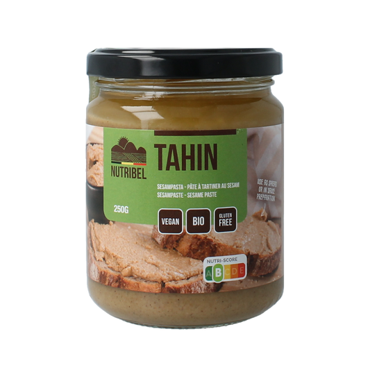 Organic Nutribel Tahin sesampasta spread on bread, 250g jar, creamy sesame seed paste for toast or snacks.