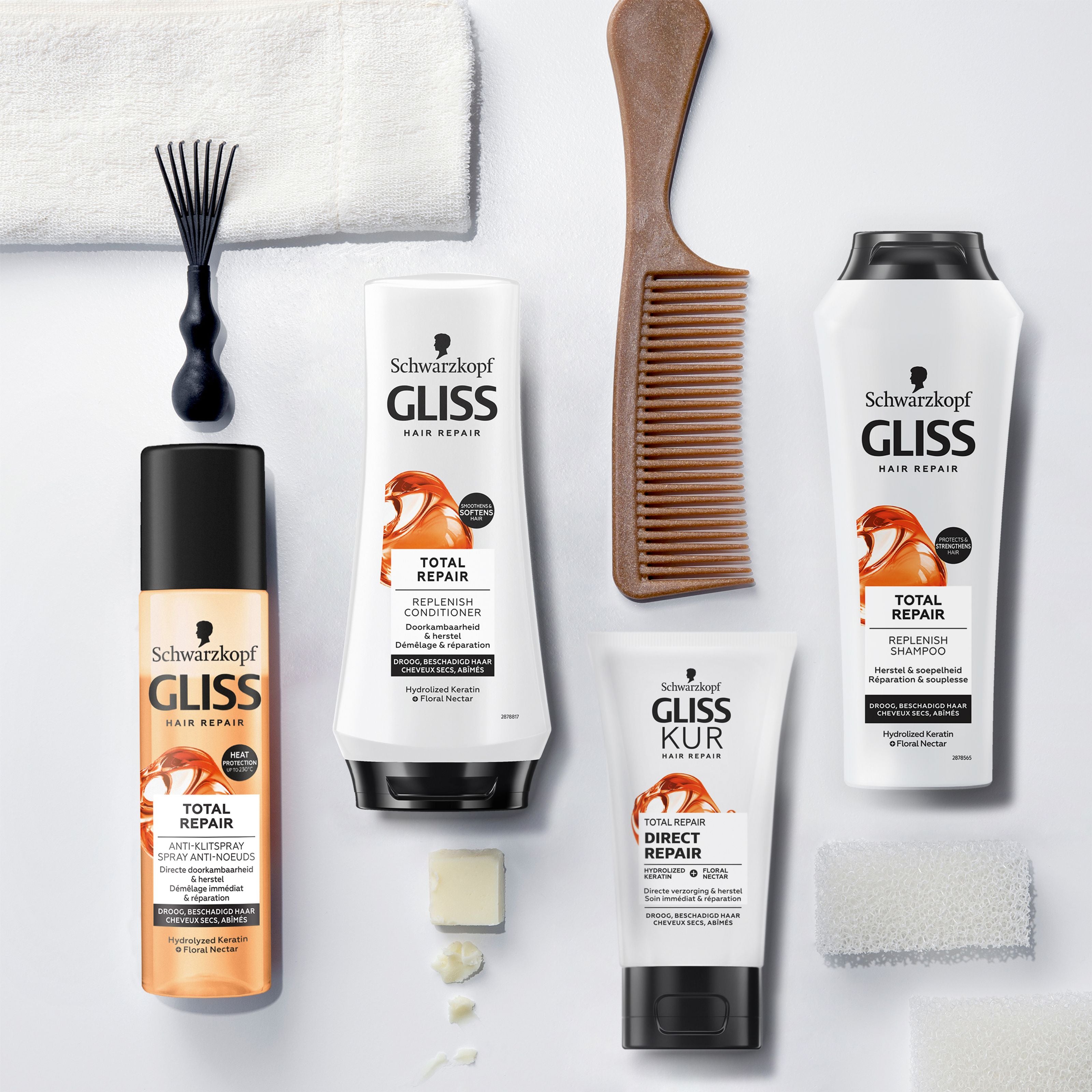 Gliss Kur total repair shampoo bottle, 250ml, for damaged hair, with sleek design and brand logo visible.