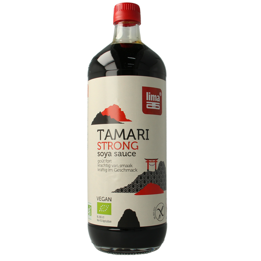 Lima Tamari strong bio soy sauce bottle, 1 liter, in a clear glass container with a dark liquid inside.