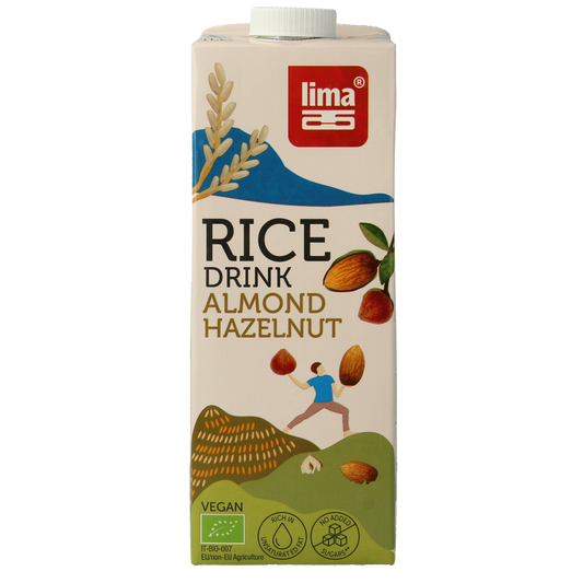 Lima organic hazelnut almond rice drink in 1-liter carton, with a beige and brown label, in a clear glass.
