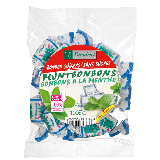 Damhert sugar-free mint candies in a clear plastic bag, showing small green mints with a smooth surface.