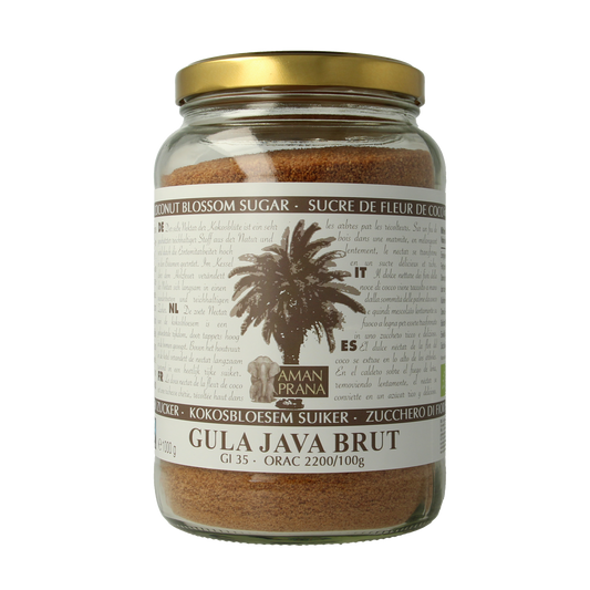 Amanprana Gula Java Brut Bio caramel-colored organic sugar in a 1kg package, with a textured surface and label details visible.