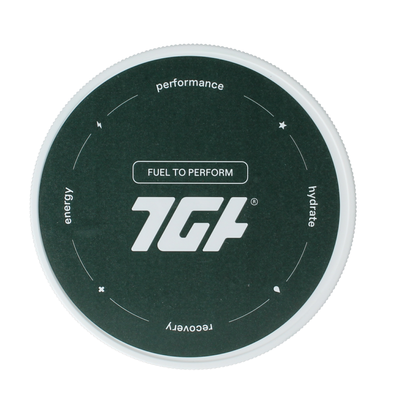 The Green Athlete Mango Electrolytes mineral supplement container, 320 grams, featuring a vibrant mango flavor label.